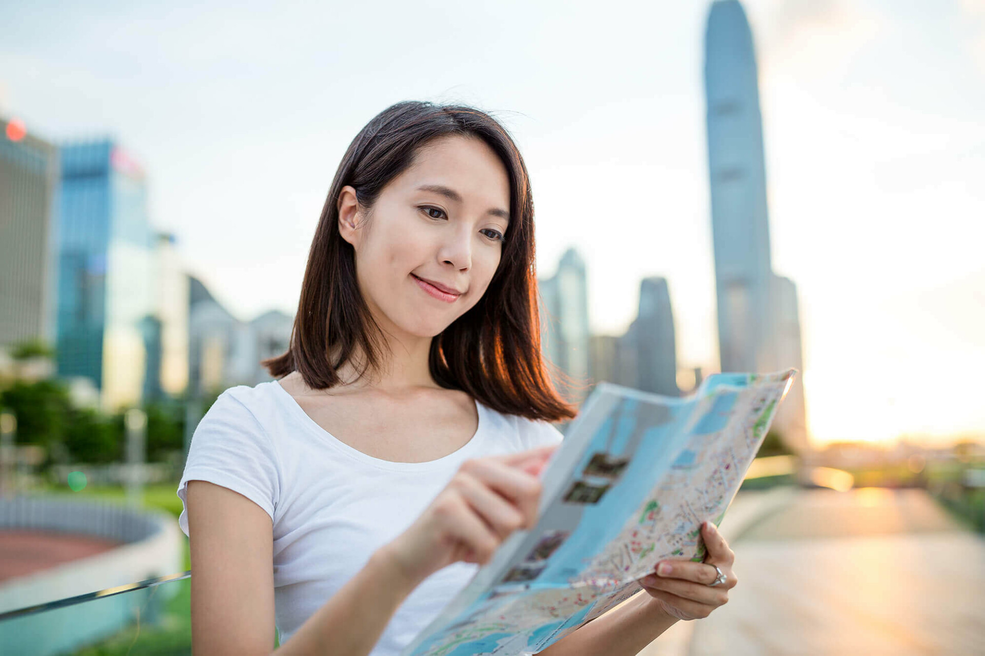 woman-looking-at-city-map-in-hong-kong-5F9B73E-1.jpg
